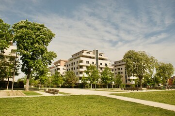 Fototapeta na wymiar modern residential buildings with a large park and playground