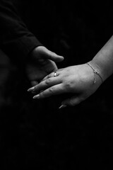 Close-up hand contact. The concept of meetings and breakups. Romance.