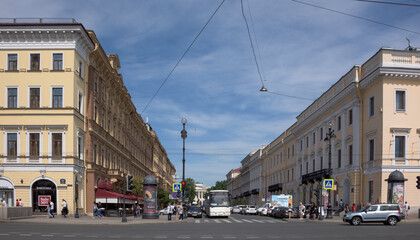 Naklejka na ściany i meble Nevsky Avenue with moving on it pedestrians and cars