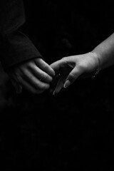 Close-up hand contact. The concept of meetings and breakups. Romance.