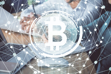 Double exposure of blockchain theme drawing over people taking notes background. Concept of cryptocurrency