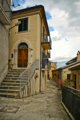Muro Lucano, Italy, June 12, 2021. A narrow street among the old houses of a medieval village in the Basilicata region.