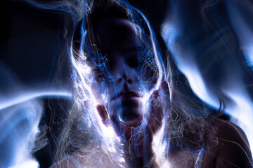 lightpainting portrait, new art direction, long exposure photo without photoshop, light drawing at long exposure	
