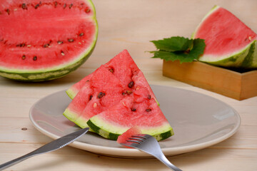 ripe sliced ​​watermelon on a plate close-up