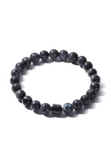 Detail shot of beaded bracelet made of gray ornamental stone and decorated with black hematite cylinder. Stylish bracelet is isolated on the white background. 