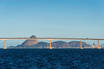 Rio - Niteroi Bridge Crossing Guanabara Bay and Sugarloaf Mountain Behind