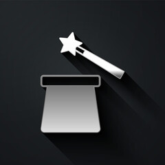 Silver Magic hat and wand icon isolated on black background. Magic trick. Mystery entertainment concept. Long shadow style. Vector