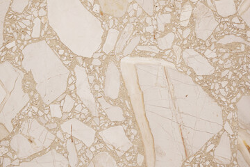 Champagne beige granite stone wall texture background