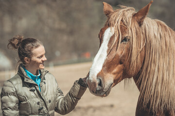 Obraz premium portrait of a horse with a young woman