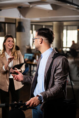 Portrait of handsome businessman. Young man working in the office..