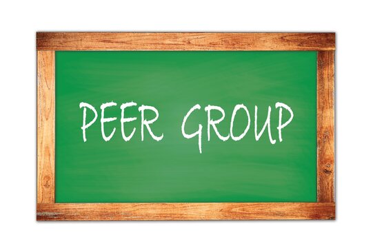 PEER  GROUP text written on green school board.