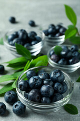 Fresh berry concept with blueberry on gray textured table