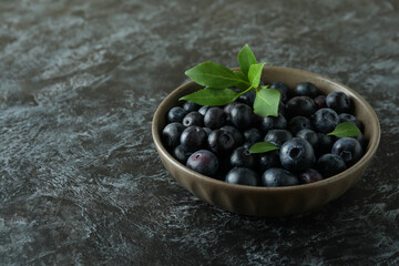Fresh berry concept with blueberry on black smokey table