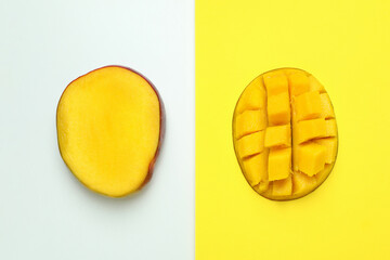 Ripe mango fruit on two tone background