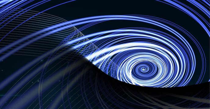 Digitally generated image of blue spiral light trails against black technology background
