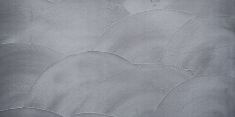 Gray trowel wavy stucco texture background. Japanese modern style mortar and cement finishing...