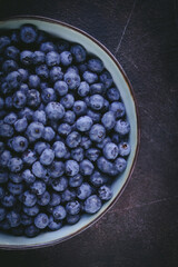 Blueberry close-up, Atmospheric photography on a dark background, Selective focus