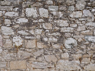 A close-up on a stone wall at Batz-sur-mer. June 2021, France.