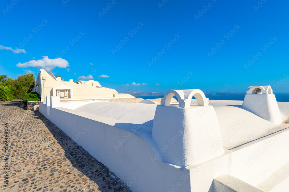 Wall mural Greece Santorini Island In Cyclades, Wide view of islands sights in Fira white whitewashed colors