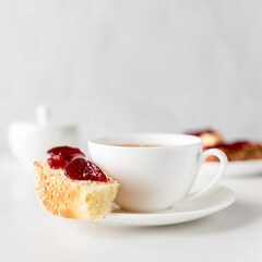 cup of coffee and cake on white