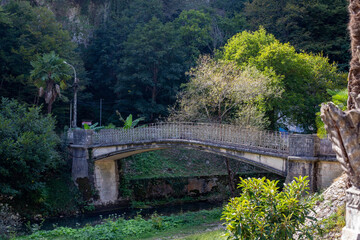 old bridge over the river in the park