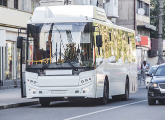 City bus at a stop on street