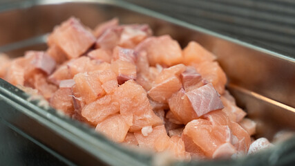 Cut smoked trout in a restaurant kitchen