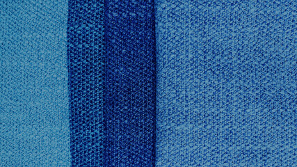 close up image of interior drapery fabric samples palette in blue color tone. macro view of textile woolen fabric texture background. multi blue tone of jean or denim fabric.