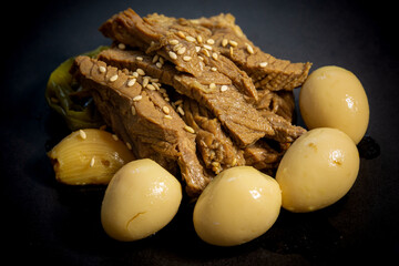 Jangjorim, beef braised in soy sauce with quail eggs