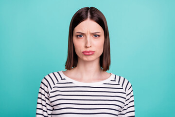 Photo of grumpy offended lady pout lips look camera wear striped shirt isolated on turquoise...