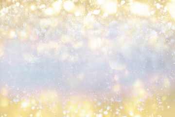 Gold light Festive Christmas background. Abstract twinkled bright background with bokeh defocused golden lights