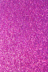 Abstract pink bright background with multicolored sparkles. Festive concept. Vertical background