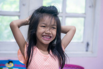 A 5-year-old Asian girl broke her first tooth.