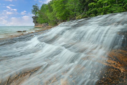 Spring landscape of Chapel Beach, Waterfall, and Rock, Lake Superior, Pictured Rocks National Lakeshore, Michigan's Upper Peninsula, USA