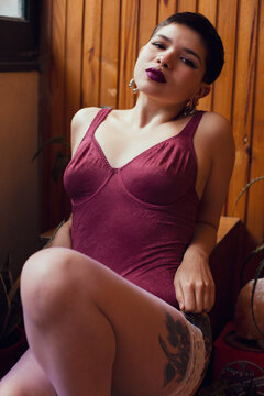 Portrait of a sensual beautiful tattooed woman