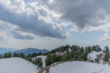 Mushk Puri hilltop in cloudy weather covered in ice