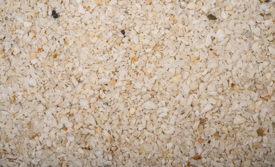 Small white pebble pieces making a pattern background