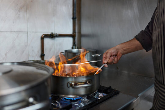 Chef cook food with fire 