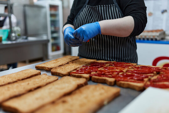 Preparing food for take away at kitchen