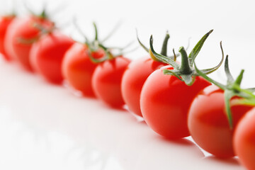 cherry tomatoes on white background