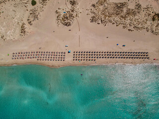 Aerial view of Simos beach in Elafonisos island in Greece. Elafonisos is a small Greek island the Peloponnese with idyllic exotic beaches and crystal clear waters. Laconia, Greece, Europe