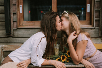 Two lesbians have a date in cafe