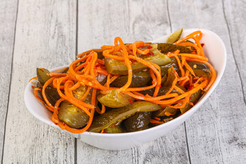 Pickled cucumbers with carrot and herbs