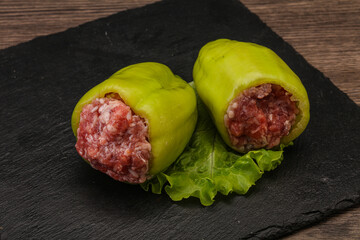 Raw stuffed bell pepper with meat