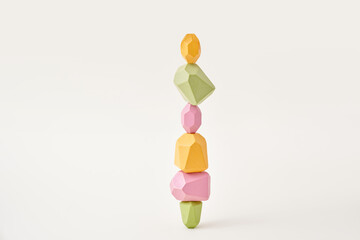 Stack of balanced colored wooden pieces