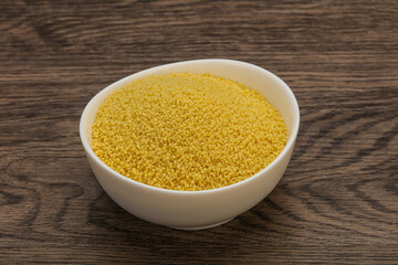 Raw cous cous heap in the bowl
