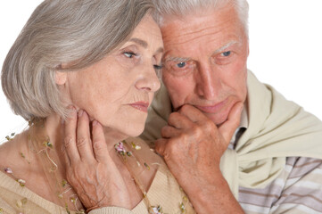 Portrait of sad senior couple