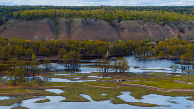 Drone flying over the meadow fields