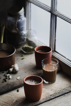 Masala Chai in rustic terracotta cups