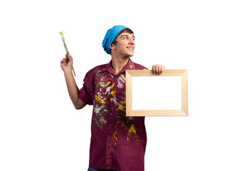 Young handsome painter artist holding paintbrush